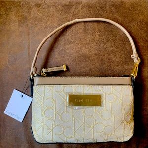 Calvin Klein Small Purse with zipper NWT.